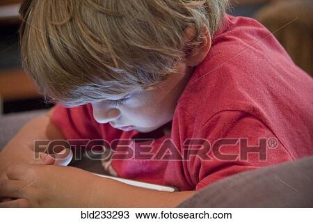 Caucasian boy watching cell phone View Large Photo Image Stock Image - Caucasian boy watching cell phone. Fotosearch