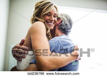 Caucasian bride hugging father View Large Photo Image Stock Photograph - Caucasian bride hugging father. Fotosearch