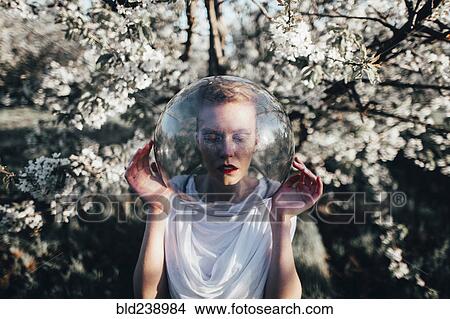 Picture - Caucasian girl wearing bubble helmet. Fotosearch