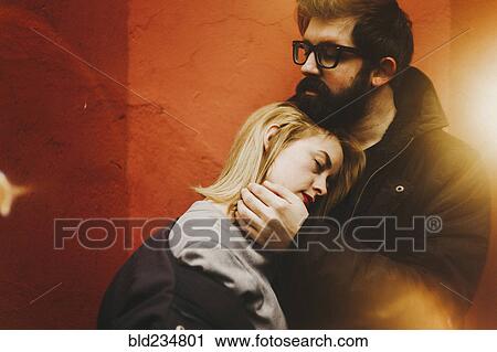 Caucasian man and woman hugging View Large Photo Image Stock Image - Caucasian man and woman hugging. Fotosearch