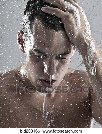 Caucasian man showering View Large Photo Image Stock Photography - Caucasian man showering. Fotosearch