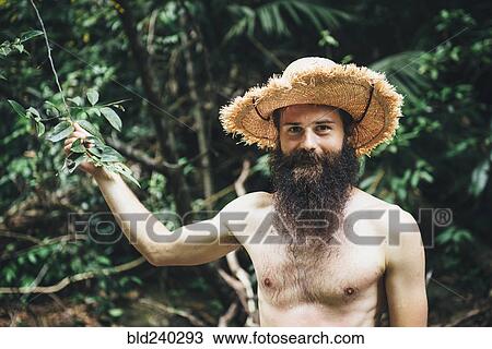 Caucasian man with bare chest holding branch in forest View Large Photo Image Stock Image - Caucasian man with bare chest holding branch in forest. Fotosearch