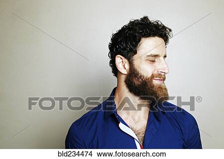 Caucasian man with beard with eyes closed View Large Photo Image Picture - Caucasian man with beard with eyes closed. Fotosearch