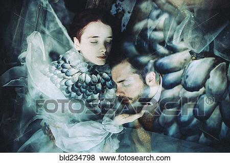 Stock Photo - Caucasian woman and man cuddling. Fotosearch