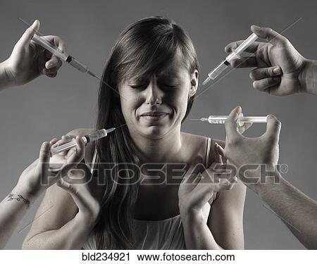 Caucasian woman fearing syringes View Large Photo Image Stock Image - Caucasian woman fearing syringes. Fotosearch