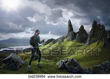 Caucasian woman hiking in rocky landscape View Large Photo Image Picture - Caucasian woman hiking in rocky landscape. Fotosearch