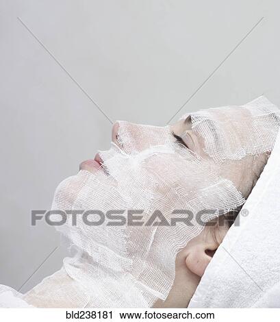 Caucasian woman receiving facial beauty treatment View Large Photo Image Stock Image - Caucasian woman receiving facial beauty treatment. Fotosearch