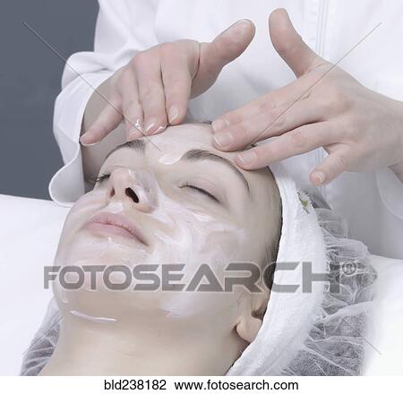 Caucasian woman receiving facial beauty treatment View Large Photo Image Stock Image - Caucasian woman receiving facial beauty treatment. Fotosearch