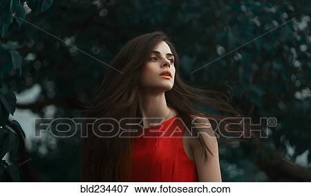 Caucasian woman spinning hair View Large Photo Image Stock Photo - Caucasian woman spinning hair. Fotosearch