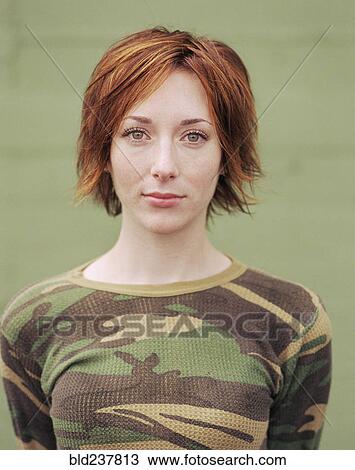 Caucasian woman wearing camouflage shirt View Large Photo Image Stock Image - Caucasian woman wearing camouflage shirt. Fotosearch