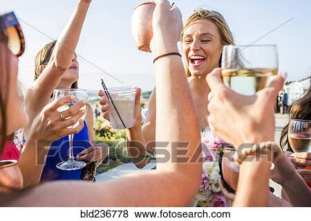 Caucasian women celebrating View Large Photo Image Stock Photo - Caucasian women celebrating. Fotosearch