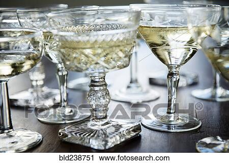Stock Image - Champagne in coupes. Fotosearch