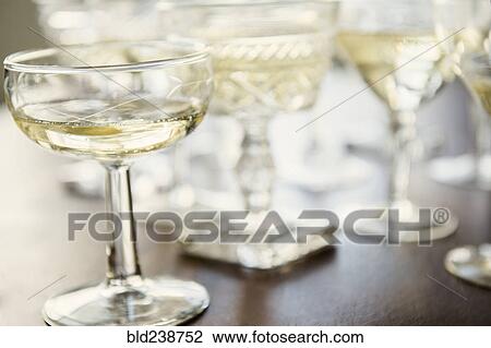 Champagne in coupes View Large Photo Image Stock Image - Champagne in coupes. Fotosearch