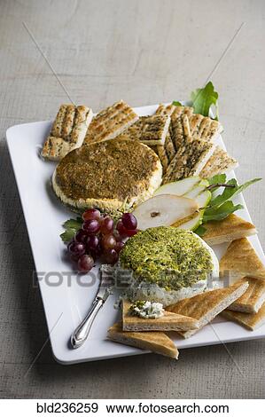 Stock Photo - Cheese and grapes. Fotosearch