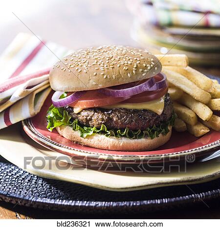 Cheeseburger with french fries View Large Photo Image Stock Image - Cheeseburger with french fries. Fotosearch