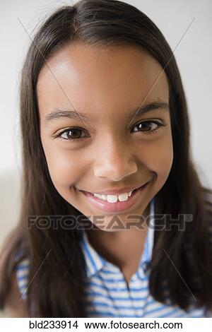 Picture - Close up of smiling Mixed Race girl . Fotosearch