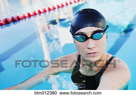 Stock Image - Competitive swimmer in swimming pool. Fotosearch