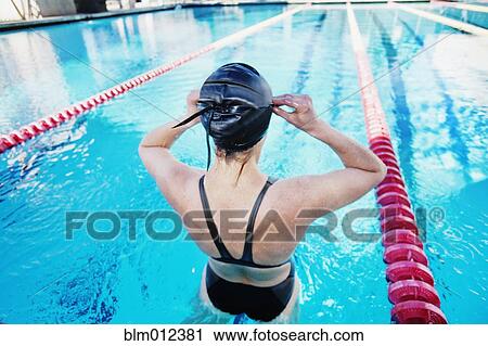 Stock Image - Competitive swimmer in swimming pool. Fotosearch