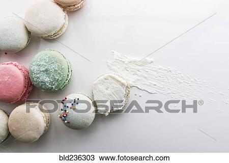 Cream spread near macaroons View Large Photo Image Stock Image - Cream spread near macaroons. Fotosearch