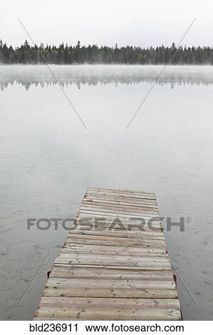 Dock on foggy lake View Large Photo Image Stock Image - Dock on foggy lake. Fotosearch