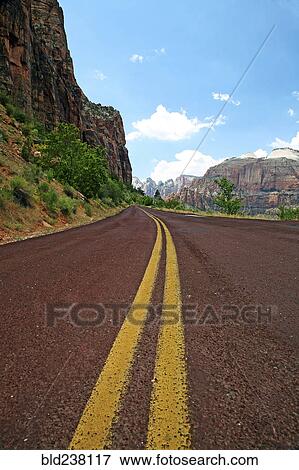Stock Photo - Empty mountain road. Fotosearch