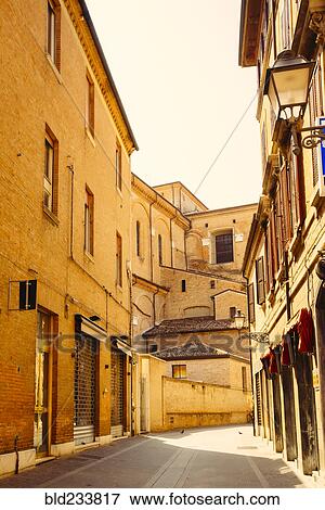 Stock Photo - "Empty street between buildings, Bologna, Emilia-Romagna, Italy". Fotosearch