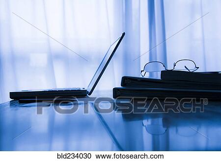 Eyeglasses and laptop near window curtains View Large Photo Image Stock Image - Eyeglasses and laptop near window curtains. Fotosearch