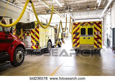 Fire trucks in fire station View Large Photo Image Stock Photo - Fire trucks in fire station. Fotosearch