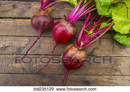 Fresh beets on wooden table View Large Photo Image Stock Photo - Fresh beets on wooden table. Fotosearch