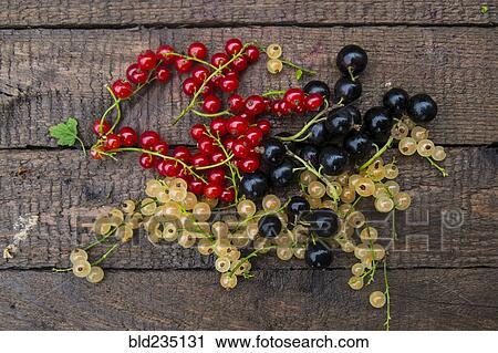 Fresh berries on wooden table View Large Photo Image Stock Image - Fresh berries on wooden table. Fotosearch
