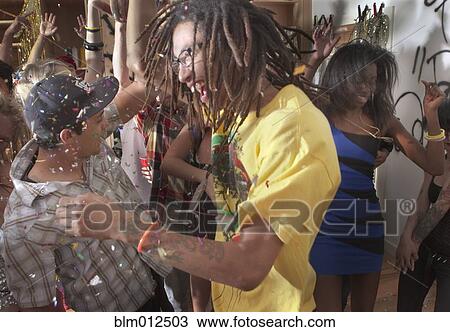 Friends dancing at party View Large Photo Image Stock Image - Friends dancing at party. Fotosearch