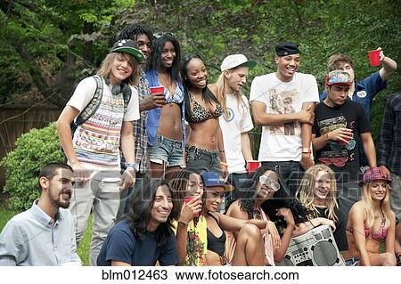 Stock Image - Friends hanging out together. Fotosearch