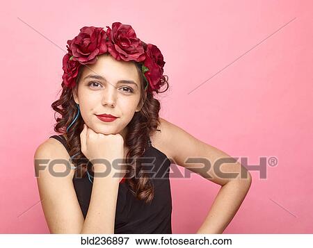 Girl with flowers in hair wearing makeup View Large Photo Image Stock Photo - Girl with flowers in hair wearing makeup. Fotosearch