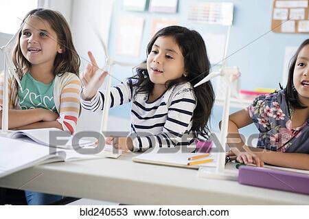 Girls learning about windmills in classroom View Large Photo Image Stock Image - Girls learning about windmills in classroom. Fotosearch
