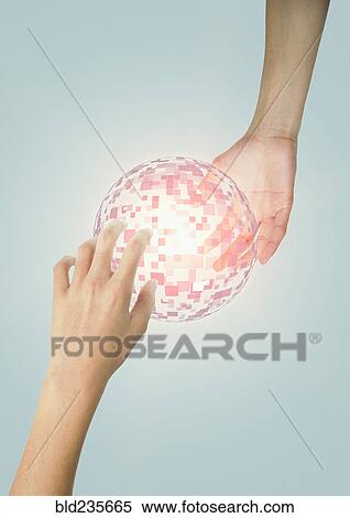 Stock Photography - Hands of Mixed Race boy holding glowing pixel sphere. Fotosearch