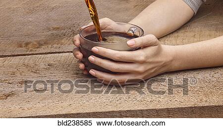 Hands of woman holding coffee cup View Large Photo Image Stock Photography - Hands of woman holding coffee cup. Fotosearch