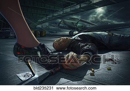 Stock Image - High heel of Caucasian woman standing on hand of man with gun. Fotosearch