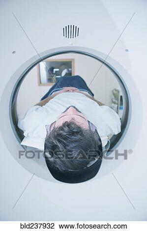 Hispanic patient in scanner View Large Photo Image Stock Image - Hispanic patient in scanner. Fotosearch