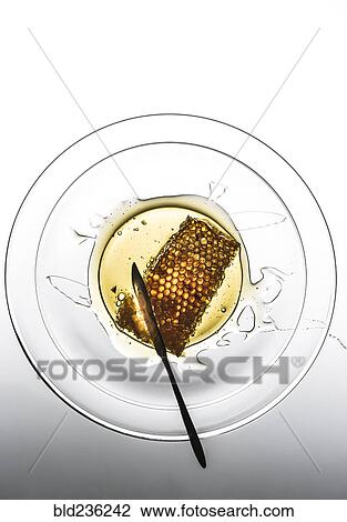 Honeycomb in bowl View Large Photo Image Stock Image - Honeycomb in bowl. Fotosearch