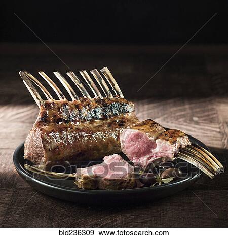 Stock Photo - Lamb chops on plate. Fotosearch