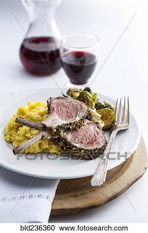 Lamb chops with brussels sprouts and red wine View Large Photo Image Stock Image - Lamb chops with brussels sprouts and red wine. Fotosearch