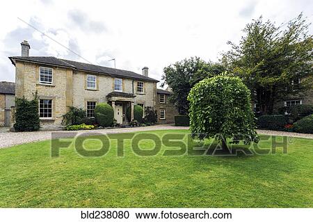 Stock Image - Large front yard of house. Fotosearch