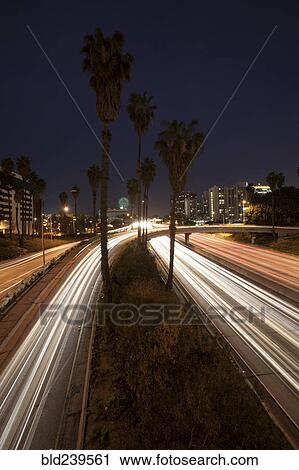 Lights on urban highway at night View Large Photo Image Stock Image - Lights on urban highway at night. Fotosearch
