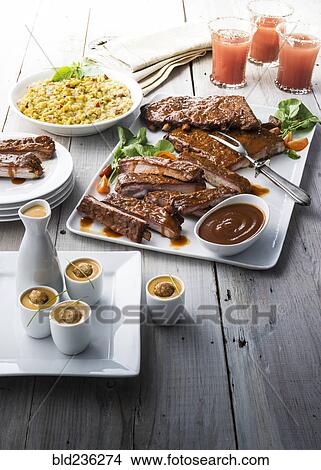 Picture - Lobster shooters and ribs. Fotosearch