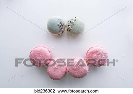 Macaroons forming smiley face View Large Photo Image Stock Image - Macaroons forming smiley face. Fotosearch