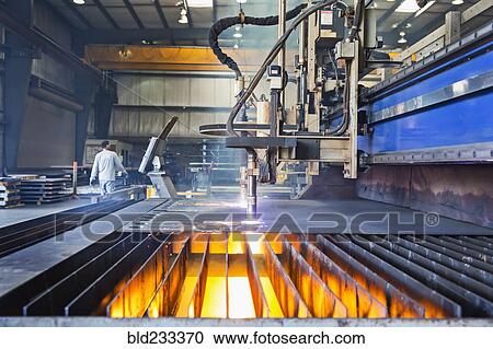 Machinery fabricating metal in factory View Large Photo Image Stock Image - Machinery fabricating metal in factory. Fotosearch