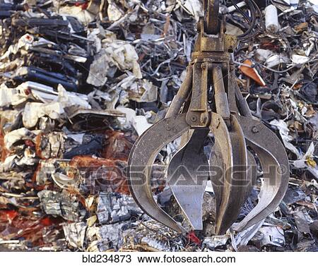 Mechanical grabber in junkyard at night View Large Photo Image Stock Image - Mechanical grabber in junkyard at night. Fotosearch
