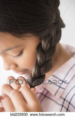 Mixed Race Girl Braiding Hair Stock Image Bld233930 Fotosearch