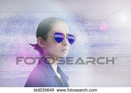 Stock Photo - Mixed Race girl wearing heart-shape sunglasses in data cloud. Fotosearch