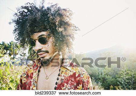 Mixed Race man wearing sunglasses View Large Photo Image Stock Photo - Mixed Race man wearing sunglasses. Fotosearch
